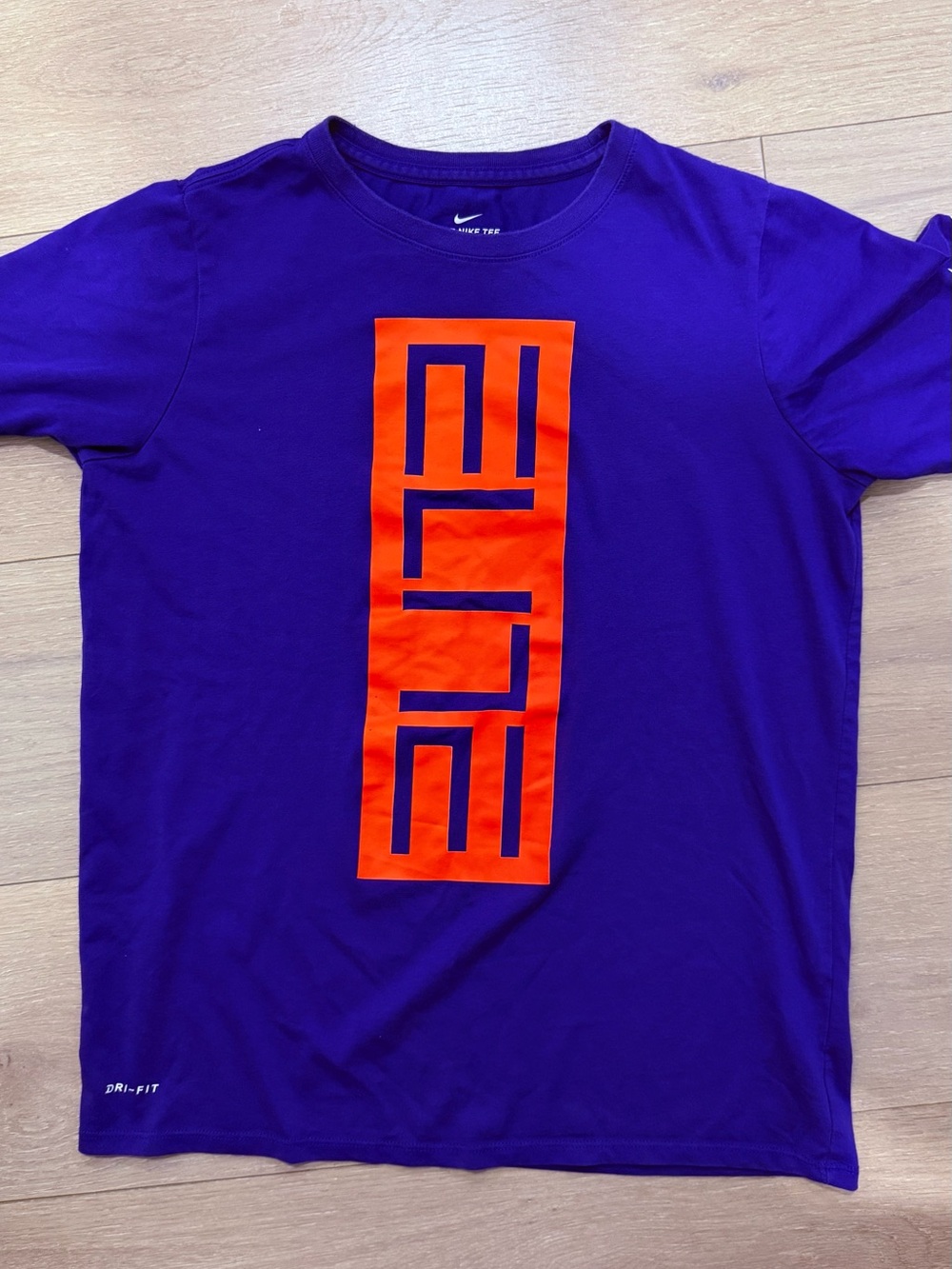 Nike Purple Tee with Bold Orange Center Graphic